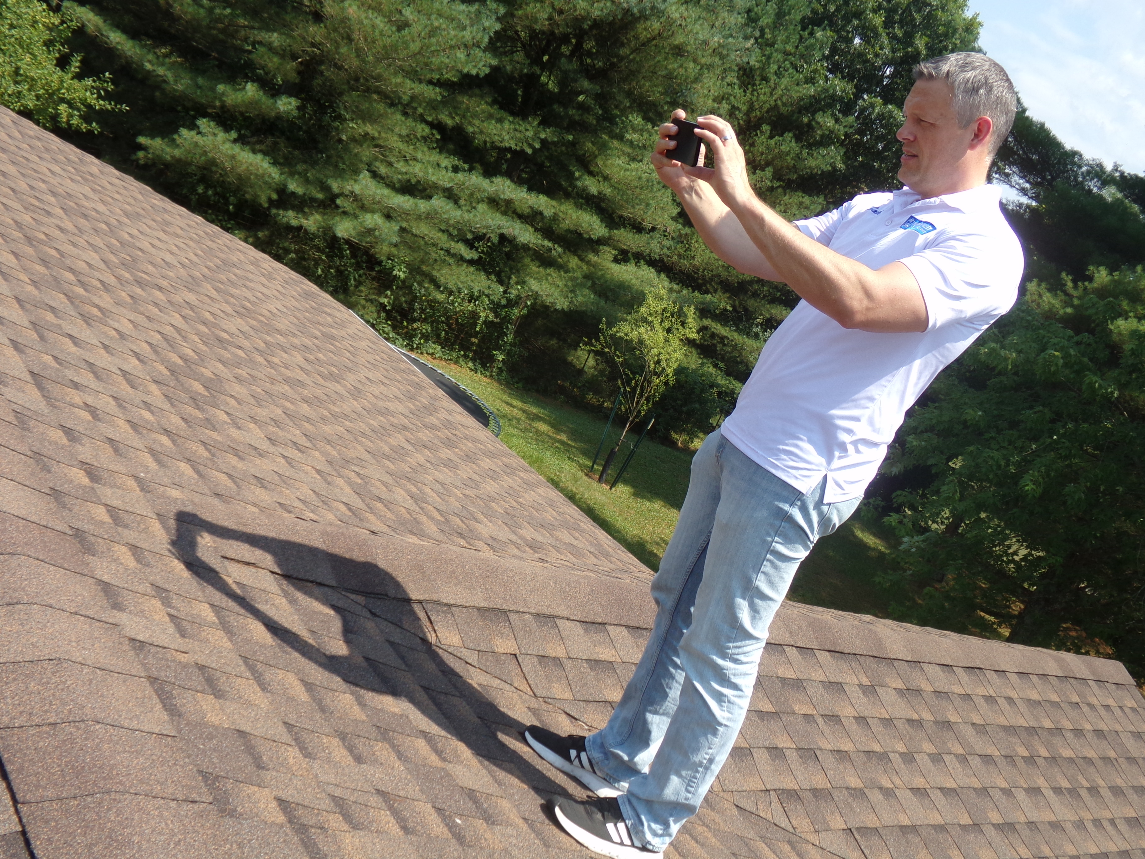 Ohio River Valley Home Inspections owner Josh Lawson on a roof.
